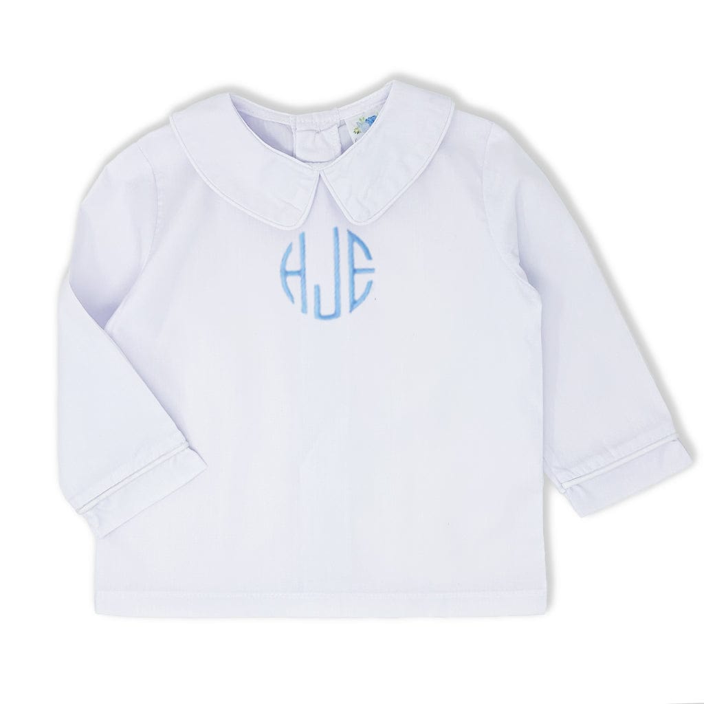 Boys white shirt with blue monogram on chest.