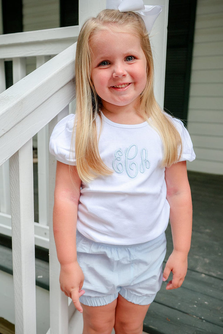 Brooke Collins Photography - Smiling girl in white outfit