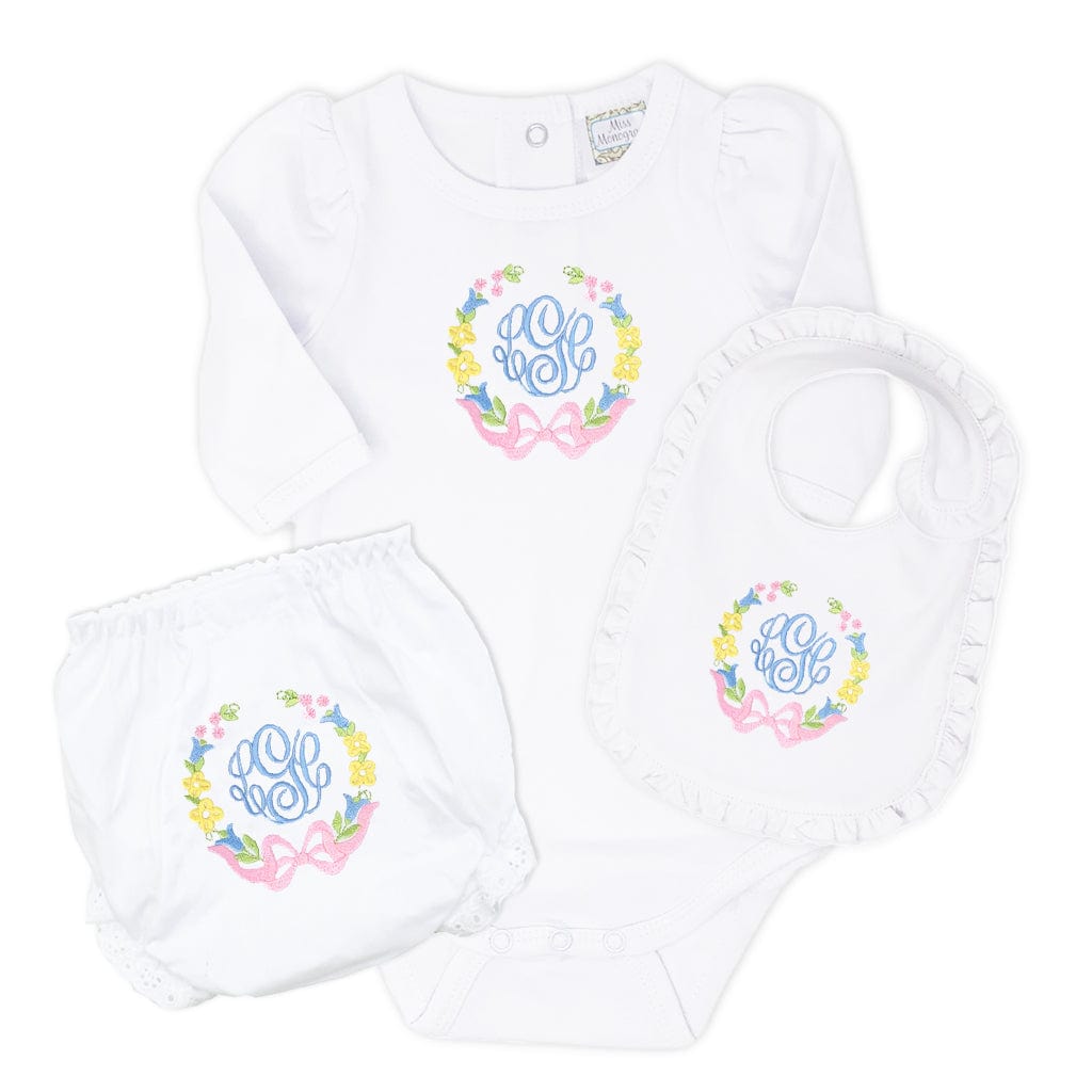 Pastel floral baby bodysuit, bloomers, and bib set