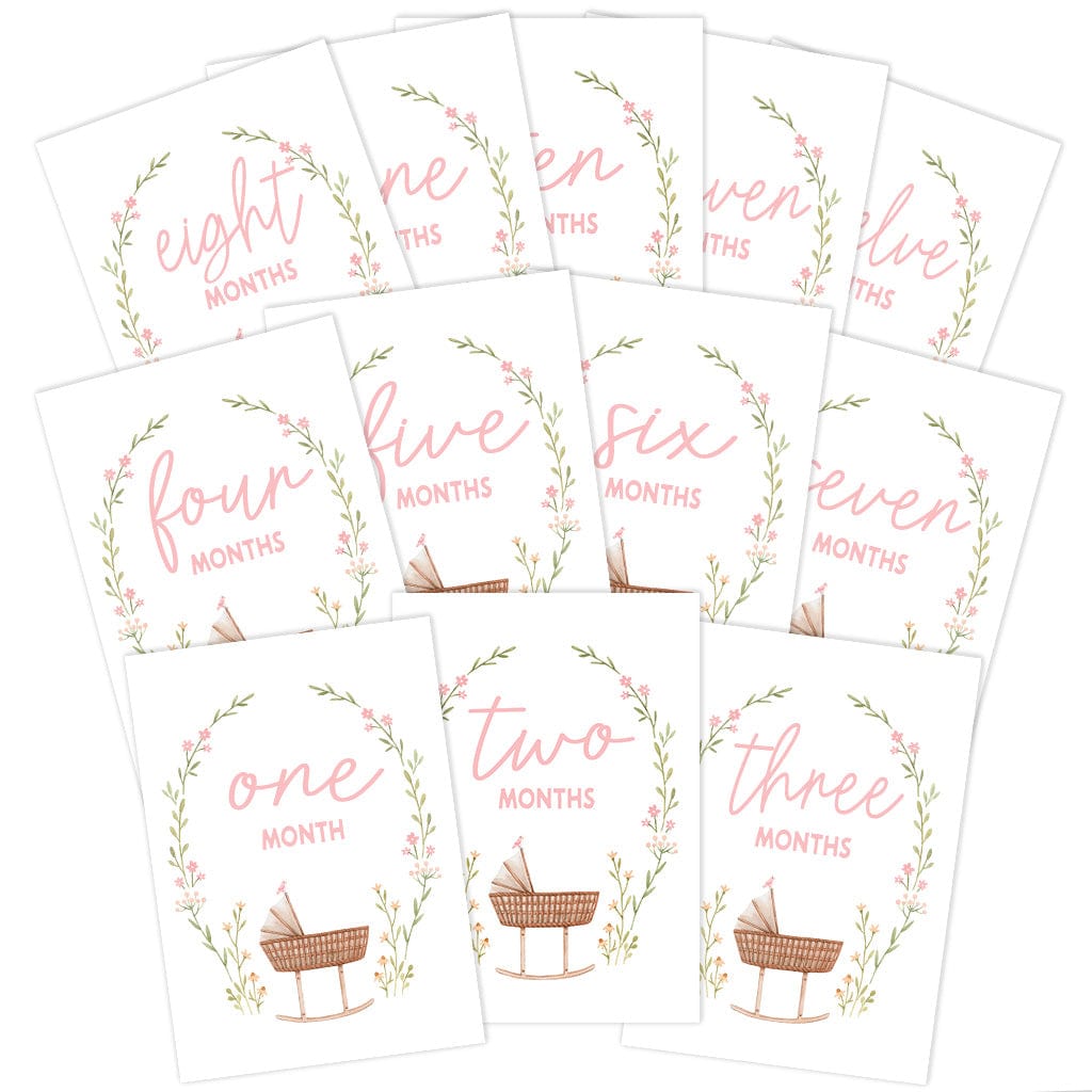 Pink milestone baby cards with floral wreath design