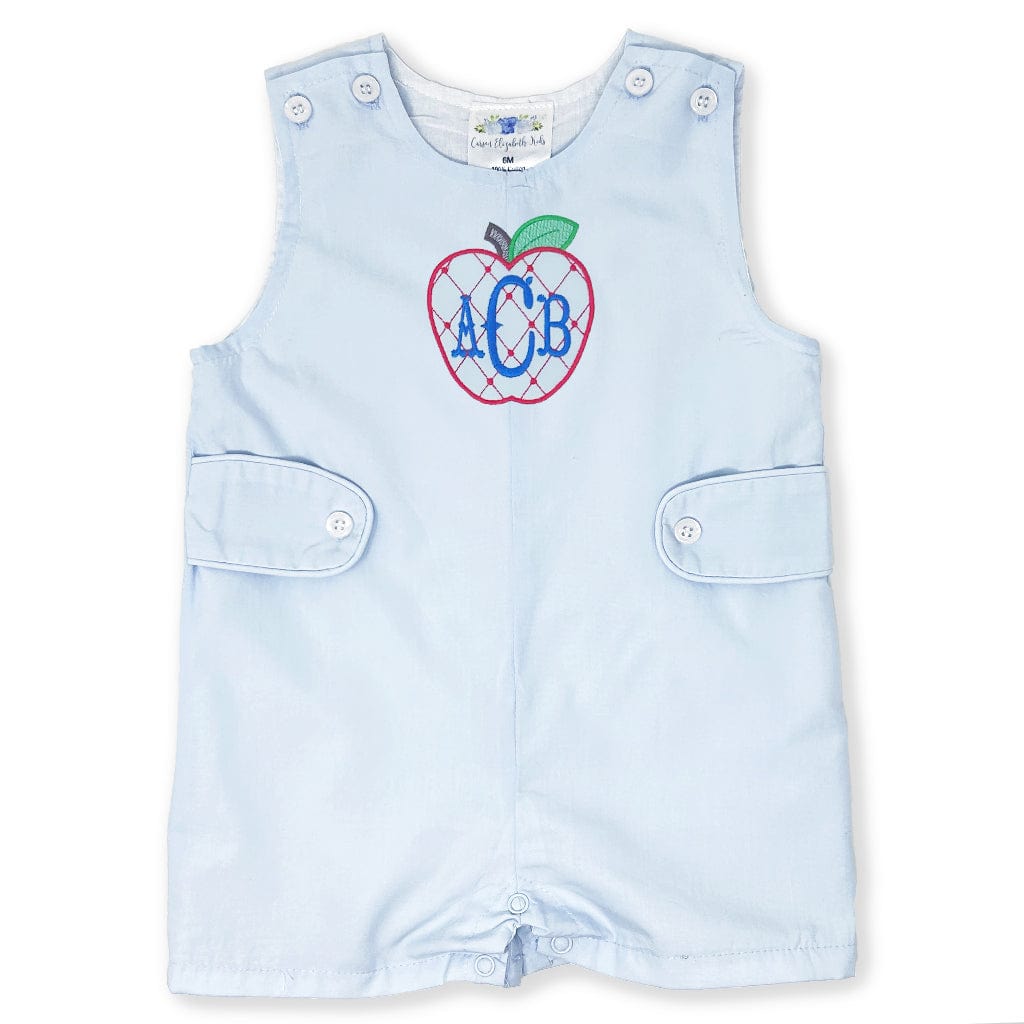 Light blue overalls with an embroidered apple design and monogram