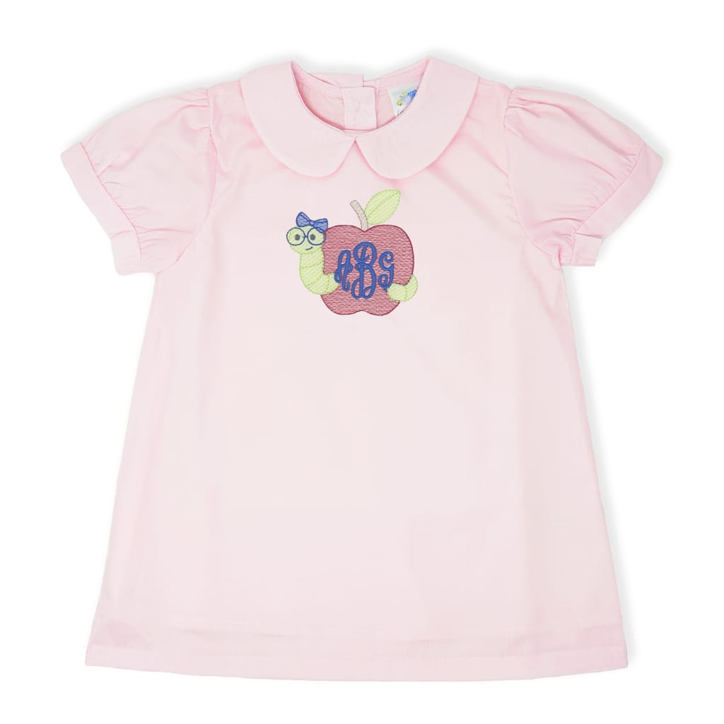 Girls dress with embroidered bookworm design and monogram