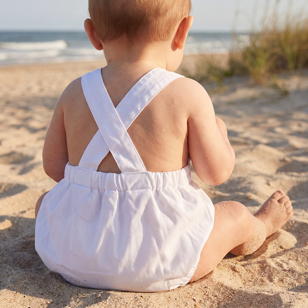Boys White Sunsuit with Straps that cross in the back