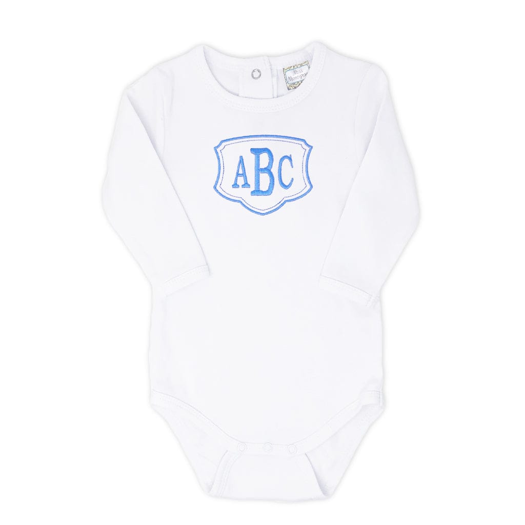 White baby onesie with blue monogram and frame
