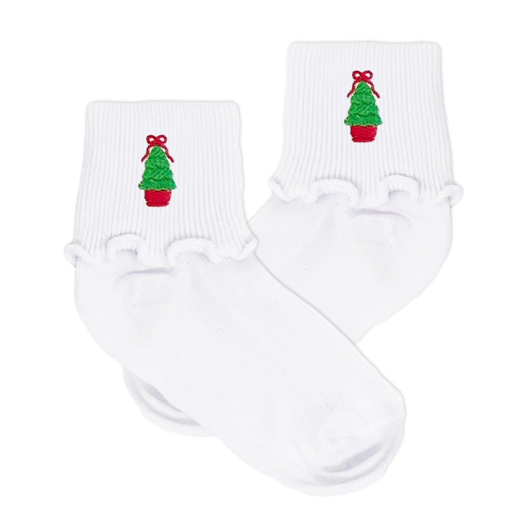 Classic Christmas socks for girls with embroidered trees and red bows, perfect for festive wear.