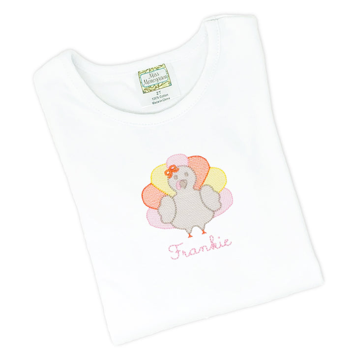 Autumn-inspired girl's tee shirt with classic turkey embroidery and personalized name