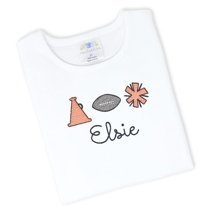 Girls football tee with an embroidered name stitched in team colors