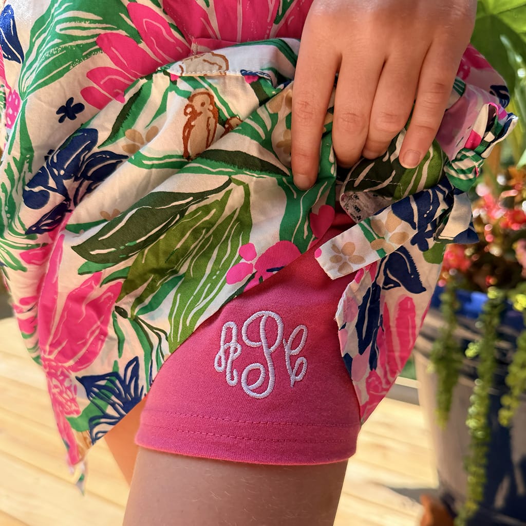 Girls Monogrammed Hot Pink Cartwheel Shorts under a floral dress