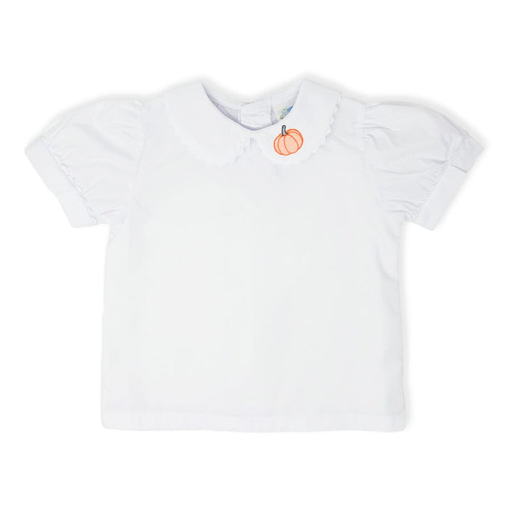 photo of a white pumpkin peter pan shirt with white ric rac around the collar and orange pumpkins