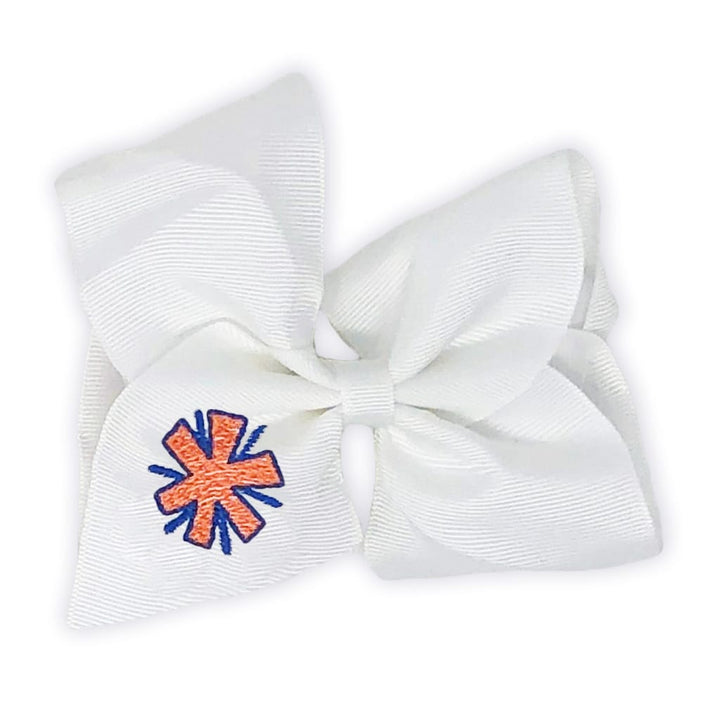 Hair bow with an embroidered pom pom stitched in team colors