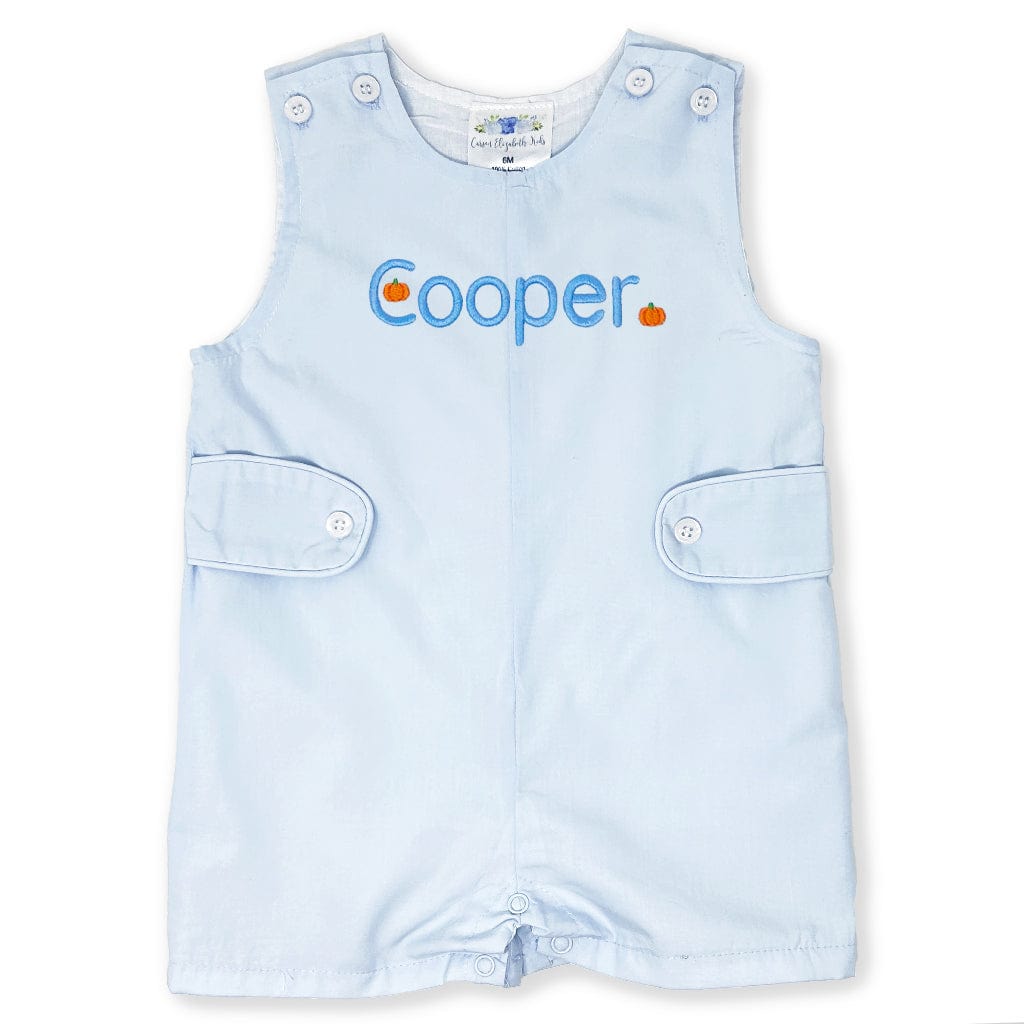 Light blue romper with 'Cooper' printed on it against a white background