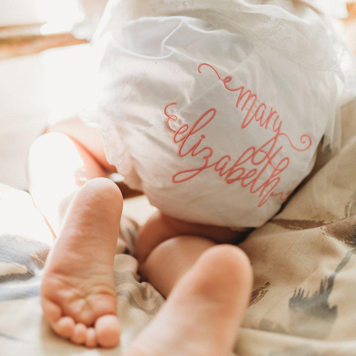 Monogrammed baby bloomers with script font